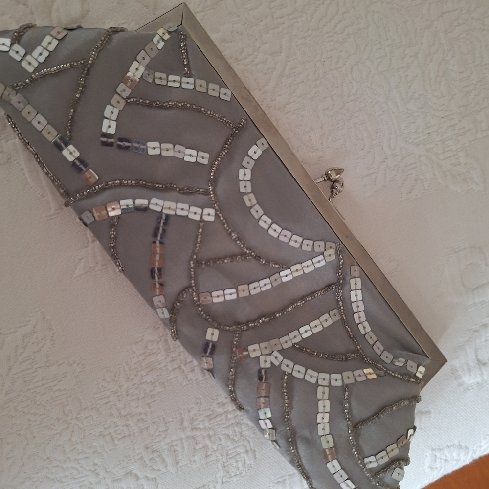 Metaphor Silver Clutch with Sequin Design